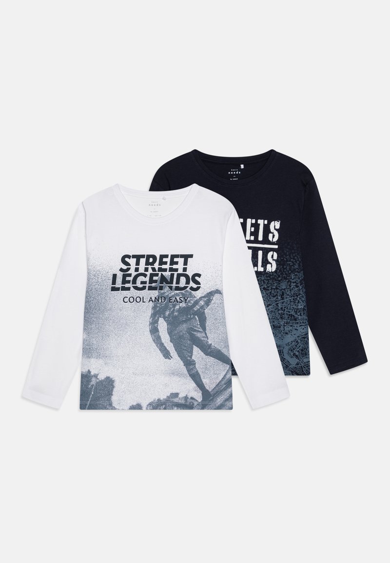 Two long-sleeve t-shirts: one white with a blue graphic of a skateboarder and text, and one navy with white text and a gradient design.