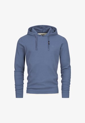 Modrá mikina s kapucí vyrobená z texturované látky, se šňůrkovou kapucí, dlouhými rukávy a malou přední kapsou. Bílý lem na spodním okraji.