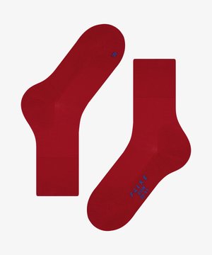 Chaussettes rouges en mélange de coton. Présentent des bords côtelés, un talon et un orteil renforcés. Incluent le texte bleu "FALKE RUN" et les détails de taille.