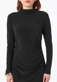 Modanisa REFKA - Maxikjoler - black