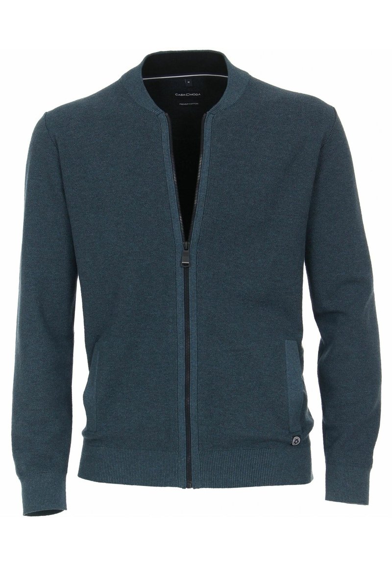 Teal zip-up kofta i texturerad bomull. Har en ribbad krage, manschetter och nederkant, med två sidofickor och en logodetalj.