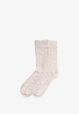 Hellgraue Wollsocken mit geripptem Bündchen, weichem Textil und nahtlosem Zehenbereich. Sie zeigen ein einfaches, klassisches Design, das sich für den täglichen Gebrauch eignet.