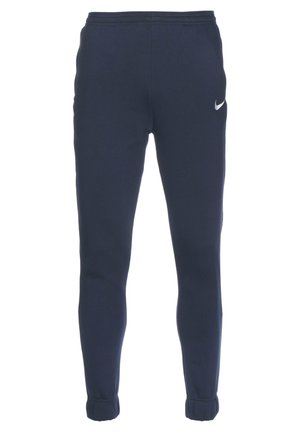 Marineblauwe joggingsbroek van zacht materiaal, met een taps toelopend ontwerp, elastische tailleband en wit Nike-logo op de linker bovenbeen.