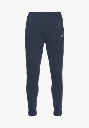 Marineblauwe joggingsbroek van zacht materiaal, met een taps toelopend ontwerp, elastische tailleband en wit Nike-logo op de linker bovenbeen.