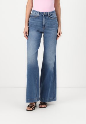 Good American GOOD WAIST PALAZZO COMPRESSION - Zvonové džínsy - indigo