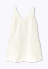 Robe blanche sans manches avec un décolleté en V, motif circulaire subtil et deux poches avant sur un fond uni.