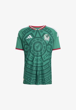 Green soccer jersey with red and white accents, featuring intricate black patterns. Includes the Mexico national team logo and Adidas branding.