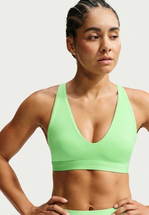Nike Performance W NK DF INDY STRAPPY BRA - Sport-BH mit mittlerer Stützkraft - illusion green/black