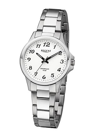 Montre-bracelet en métal argenté avec cadran blanc, chiffres arabes noirs et trois aiguilles noires indiquant 10:10:35.