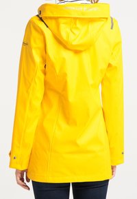 Schmuddelwedda Parkas - yellow