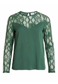 Blusa verde con maniche lunghe in pizzo, caratterizzata da uno scollo a chiave sul retro e un motivo floreale sul pizzo. Tessuto morbido e forma strutturata.