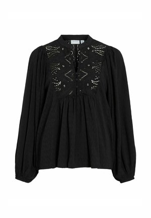 Zwarte blouse met een ronde halslijn, lange pofmouwen, versierde voorkant met geometrische uitsparingen en knopen, en geplooide stofdetails.
