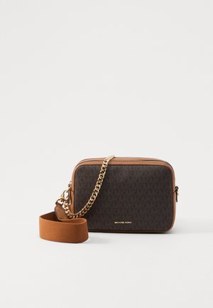 Brown patterned crossbody bag featuring a gold chain and fabric strap, with a zip closure and embossed logo on the front.