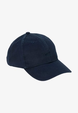Navy blue baseball cap made of cotton with a curved brim, featuring stitched accents and ventilation holes on the crown.