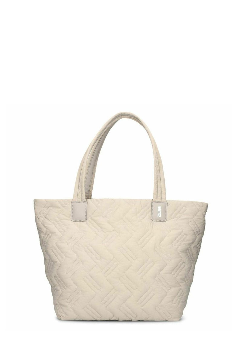 Borsa tote trapuntata di colore crema con un motivo geometrico, due manici robusti e un dettaglio logo discreto su un lato.