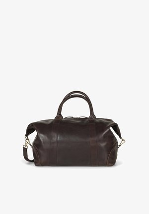Brown leather duffel bag with rounded handles, adjustable shoulder strap, minimalistic design, smooth texture, and visible stitching details.