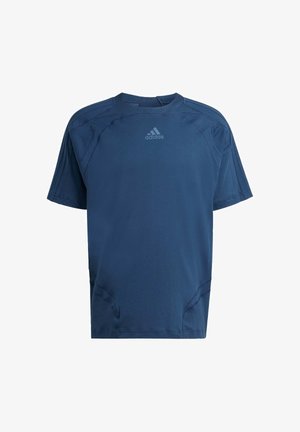 T-shirt de sport bleu marine à manches courtes en tissu lisse, doté d'un col rond, de coutures décoratives et d'un logo discret sur la poitrine.