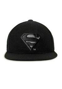 Black flat-brim cap featuring a raised textured Superman emblem in matching black and grey tones on the front panel.