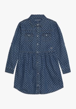 Denim long-sleeve dress with small white triangle pattern, button-down front, chest pockets, and gathered waist from Guess.