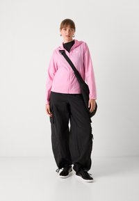 Tommy Jeans OUTDOOR JACKET - Summer jacket - carnival pink