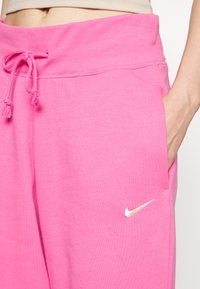 Nike Sportswear W PHNX FLC HR OS - Calças de fato de treino - pinksicle/sail