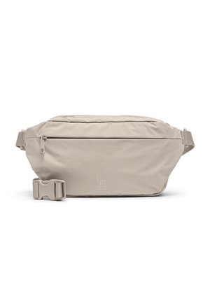 Marsupio beige chiaro con tasca frontale con zip, tracolla regolabile, fibbia in plastica e logo "GOT BAG" centrato sotto la cerniera.