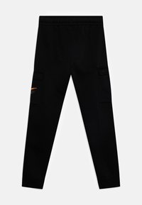 Black cargo pants with an elastic waistband, featuring two side pockets and a subtle graphic near the left pocket. Smooth fabric texture.