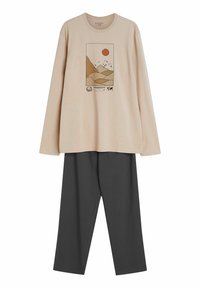 Beige long-sleeve shirt with mountain and sun graphic paired with plain dark gray straight-leg pants.