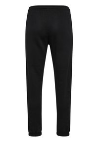 Sorte taprede joggingbukser med elastisk talje og manchetter, vist bagfra på en hvid baggrund.