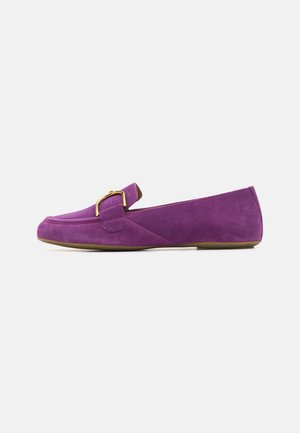 Purple suede loafers featuring a gold-tone buckle detail, flat sole, and a smooth texture with a minimalist design.
