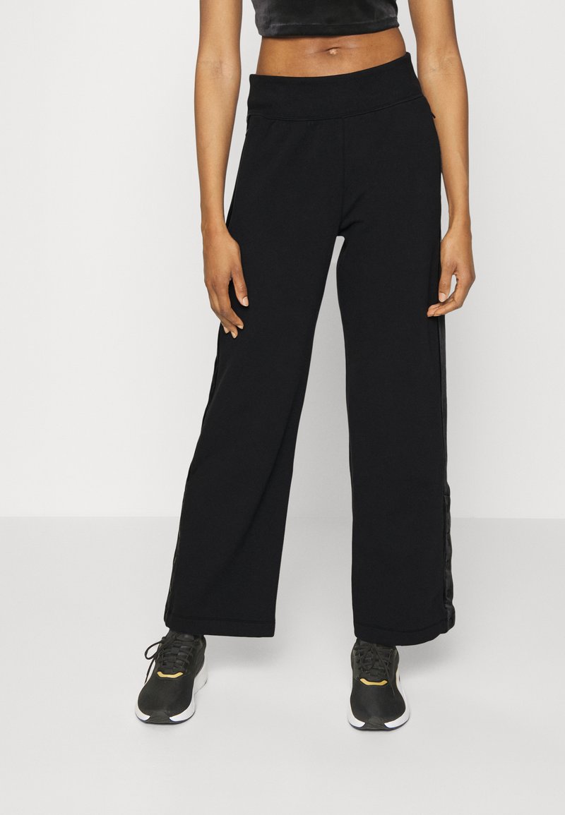 Athleta STRAIGHT LEG Tracksuit bottoms black Zalando.ie