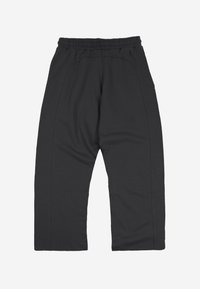 Schwarze, locker sitzende Hose mit elastischem Bund, sichtbaren Nahtlinien und leicht konisch zulaufendem Bein, flach auf einem weißen Hintergrund liegend.