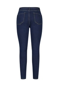 Skinny jeans gemaakt van donkerblauwe denim, met gele stiksels, een tailleband en twee achterzakken met een standaardontwerp.