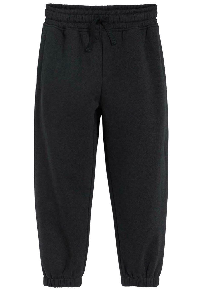 Sorte sweatpants fremstillet af blødt materiale, med elastisk talje og snøre, sidelommer og tætsiddende manchetter ved anklerne.