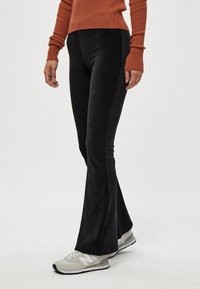 Desires DEBRITT FLARED LEGGINGS - Broek - black