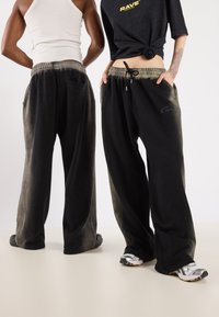YOURTURN UNISEX - Tréningruha alsók - black