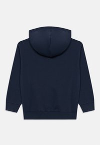 Sweat-shirt bleu marine avec une poche kangourou, des poignets et un ourlet côtelés. Il dispose d'une capuche ronde sans cordons. Tissu au toucher doux.