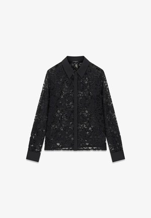 Zwarte kanten blouse met lange mouwen met bloemmotief, effen kraag, knoopmanchetten en voorste knoopsluiting.