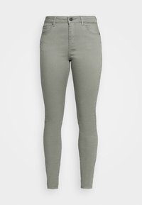 Slim-fit, högmidjade jeans i ljusgrå denim. Har fem fickor, knappstängning och en jämn yta. Inga synliga mönster eller detaljer.