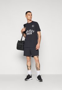 Under Armour Triko s potiskem - black/white