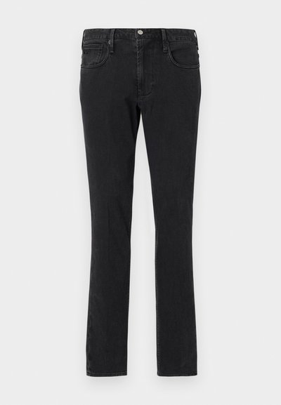 Schwarze Denim-Jeans mit schmaler Passform, Fünf-Taschen-Design und Knopfverschluss. Der Stoff hat eine glatte Struktur und dezente Verblassung.
