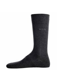 Graue, knielange Socke aus einem weichen, strukturierten Material. Verfügt über einen gerippten Bund und dezente Markenkennzeichnung an der Seite.