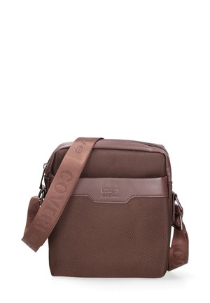 Sac à bandoulière marron avec sangle réglable, tissu texturé et logo "Coveri Active" sur le panneau avant.