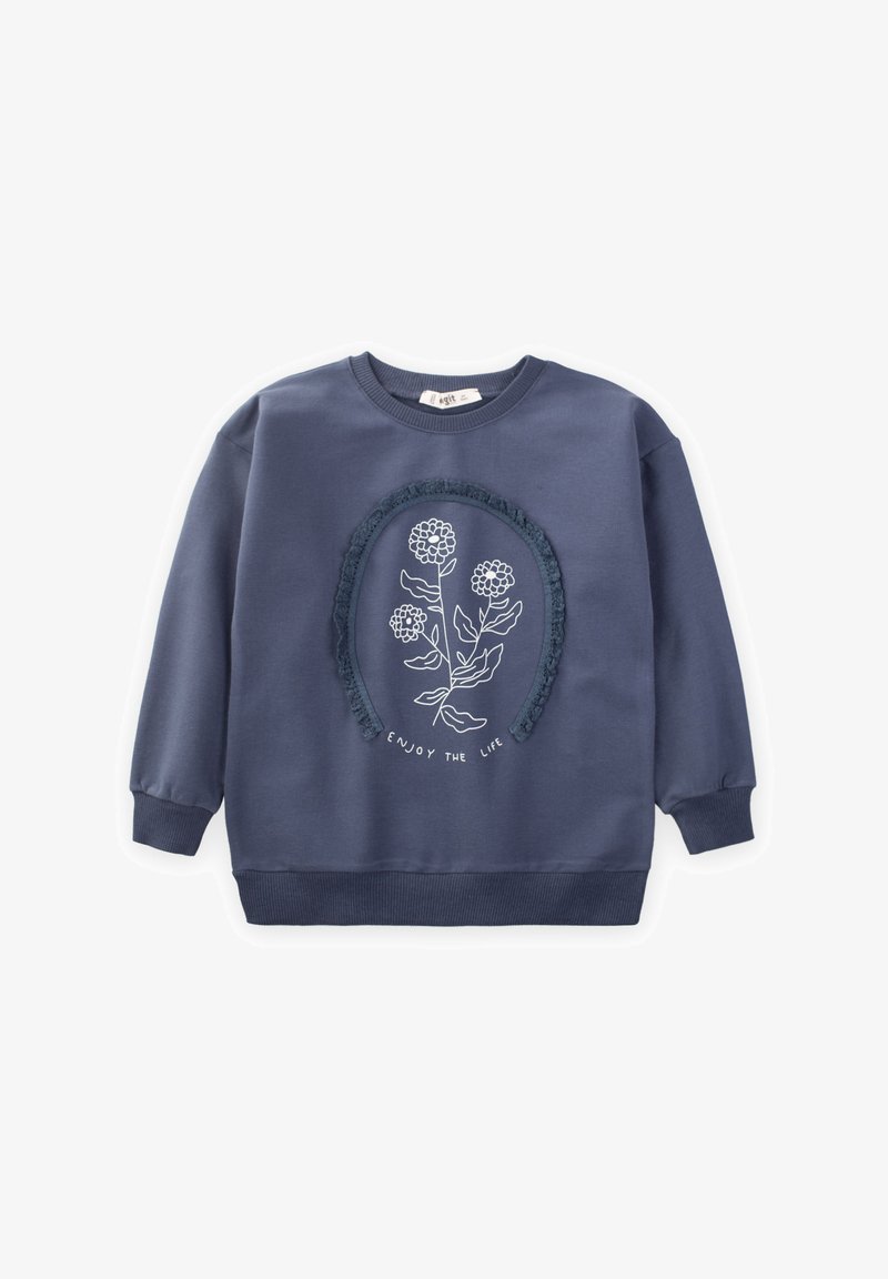 Felpa blu navy con un motivo floreale ricamato rotondo e bordo testurizzato. Presenta polsini e orlo con costine, realizzata in tessuto morbido.