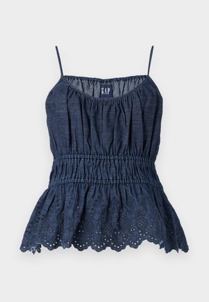 Sötétkék, ujjatlan peplum blúz, fodros derékkal és hullámos szegéllyel, kivágott virágmintákkal. Könnyű, texturált anyagból készült.