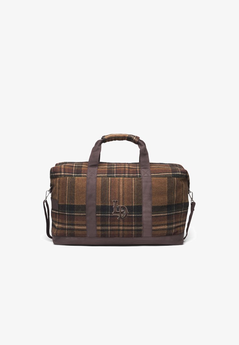 Ruda plaid stiliaus kelioninė kuprinė, pagaminta iš vilnos, su odinėmis rankenomis ir akcentais, priekyje yra siuvinėtas logotipas.