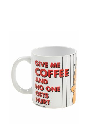 White coffee mug with a cartoon character and red text reading "Give me coffee and no one gets hurt" on the side.