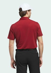 adidas Golf ULTIMATE BUNKER - Polo majica - aurora ruby