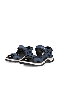 Μπλε και μαύρα αθλητικά σανδάλια ανοιχτής μύτης με ρυθμιζόμενους ιμάντες και μαλακές σόλες, σχεδιασμένα για εξωτερική χρήση και δραστήρια δραστηριότητα.