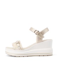 Sandali wedge beige con tomaia lucida, cinturino decorato e fibbia metallica. Suola intermedia spessa e bianca con superficie testurizzata per una buona aderenza.
